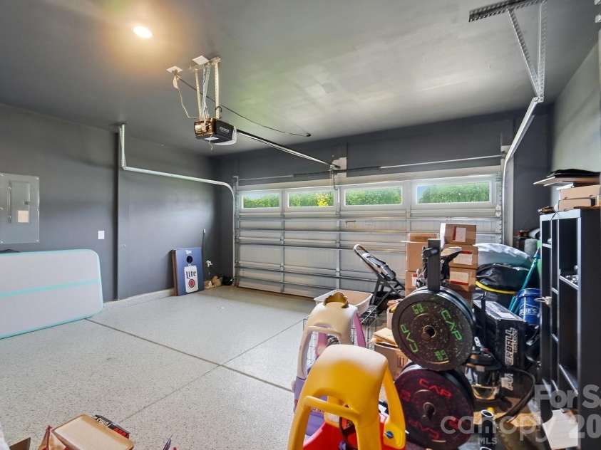 193 Adams Tree Way, Troutman, NC 28166.  MLS# CAR4405517, YatesRealty ID 42384. Epoxied Garage floor