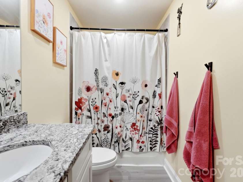 193 Adams Tree Way, Troutman, NC 28166.  MLS# CAR4405517, YatesRealty ID 42384. Guest Hall Bathroom