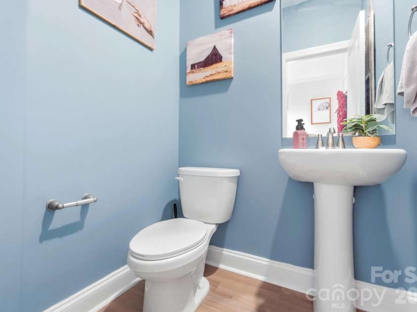 193 Adams Tree Way, Troutman, NC 28166.  MLS# CAR4405517, YatesRealty ID 42384. Half Bathroom downstairs