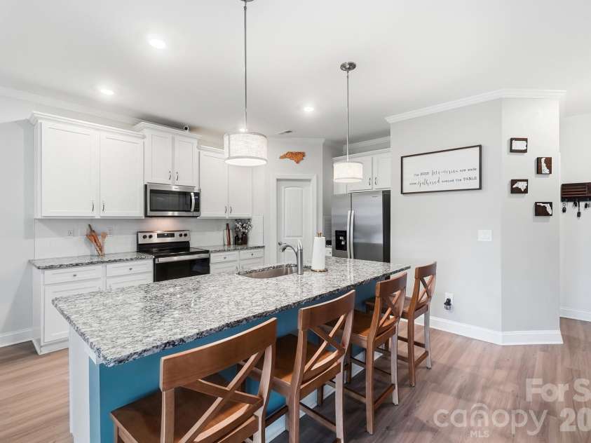 193 Adams Tree Way, Troutman, NC 28166.  MLS# CAR4405517, YatesRealty ID 42384. Large Kitchen island