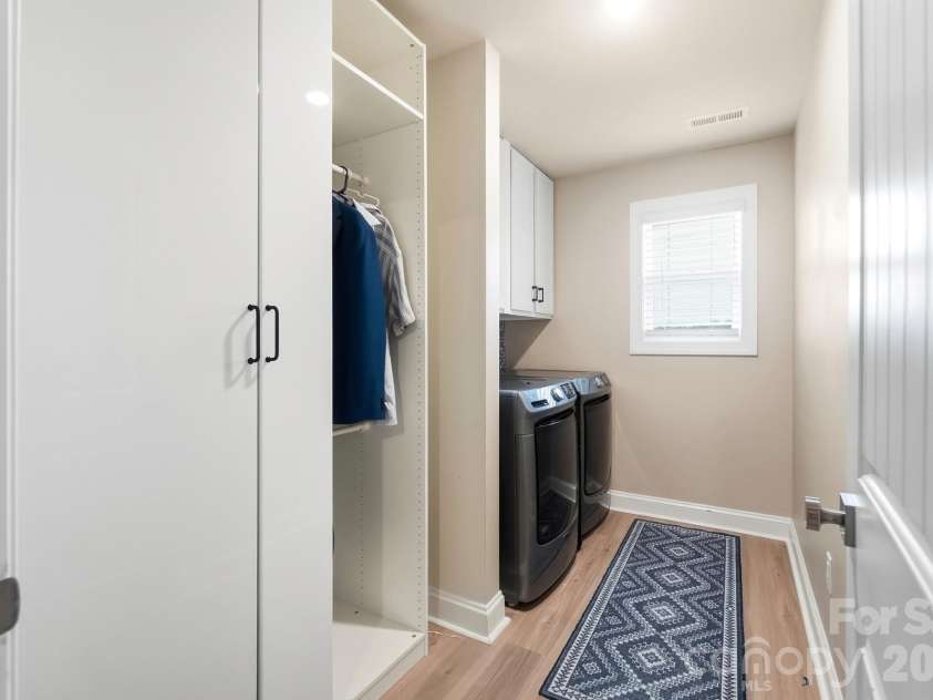 193 Adams Tree Way, Troutman, NC 28166.  MLS# CAR4405517, YatesRealty ID 42384. Laundry room with great built-in storage