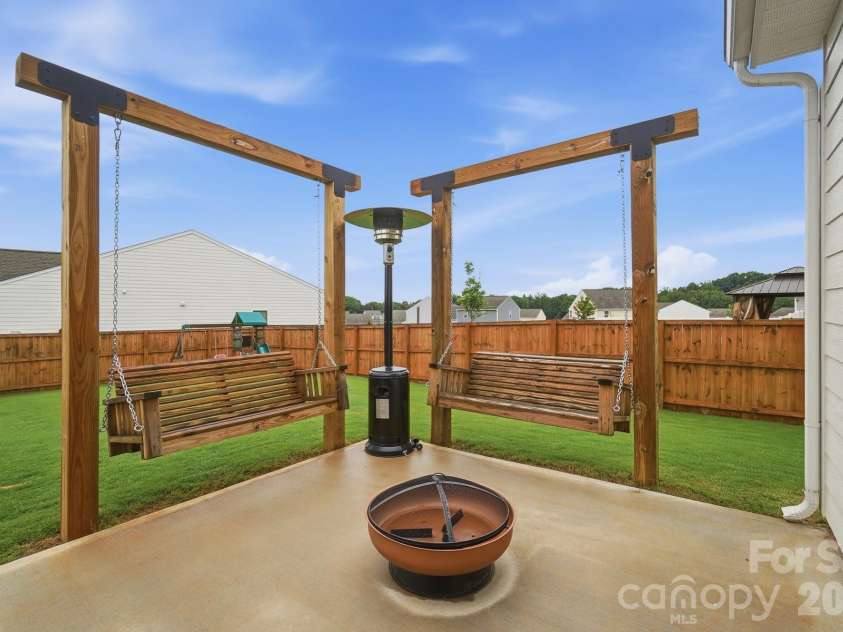 193 Adams Tree Way, Troutman, NC 28166.  MLS# CAR4405517, YatesRealty ID 42384. Porch swings