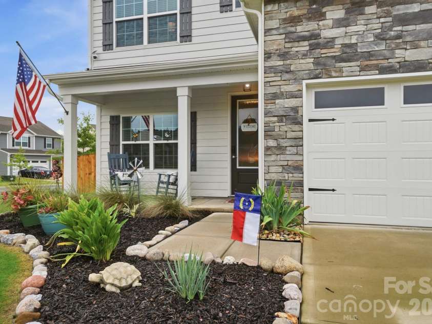 193 Adams Tree Way, Troutman, NC 28166.  MLS# CAR4405517, YatesRealty ID 42384. Upgraded landscape beds
