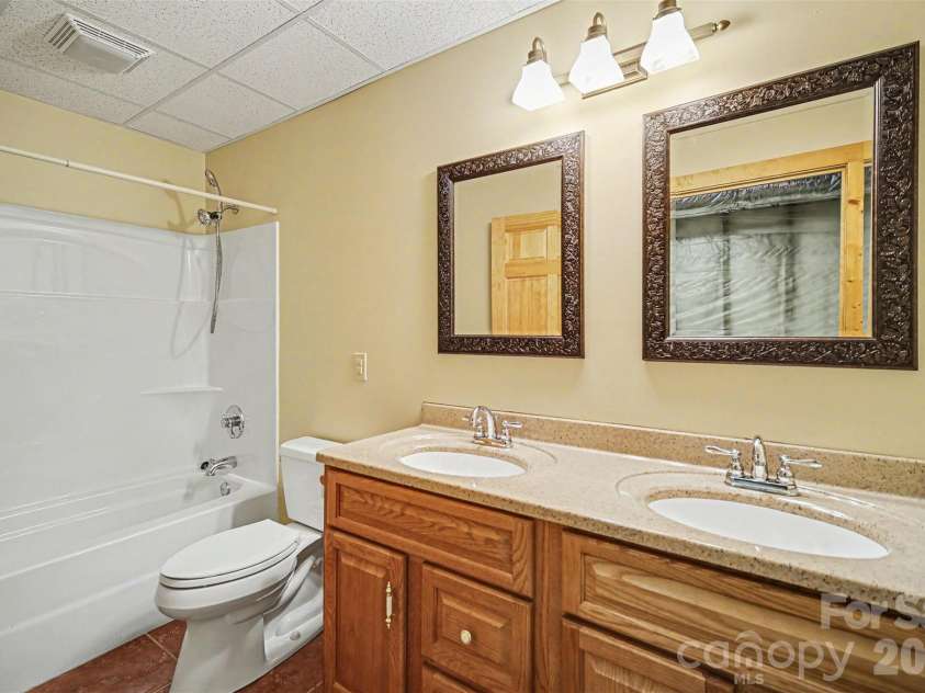4910 Arden Gate Drive, Iron Station, NC 28080.  MLS# CAR4408421, YatesRealty ID 42391. Guest Bathroom