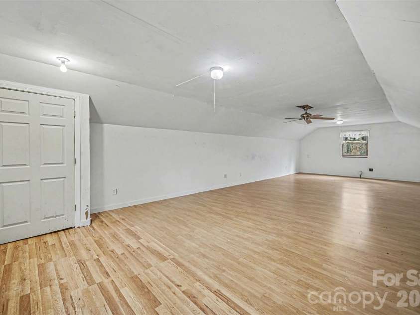 4910 Arden Gate Drive, Iron Station, NC 28080.  MLS# CAR4408421, YatesRealty ID 42391. Space above Garage
