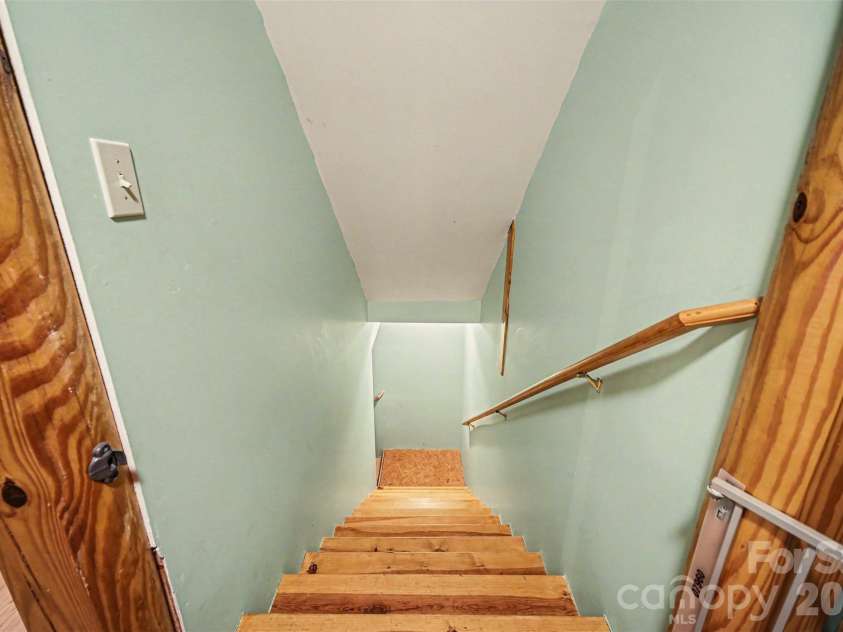 4910 Arden Gate Drive, Iron Station, NC 28080.  MLS# CAR4408421, YatesRealty ID 42391. Stairs to Basement