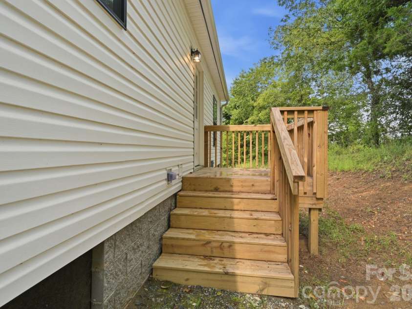 526 Cane River School Road, Burnsville, NC 28714.  MLS# CAR4405690, YatesRealty ID 42398. Back porch