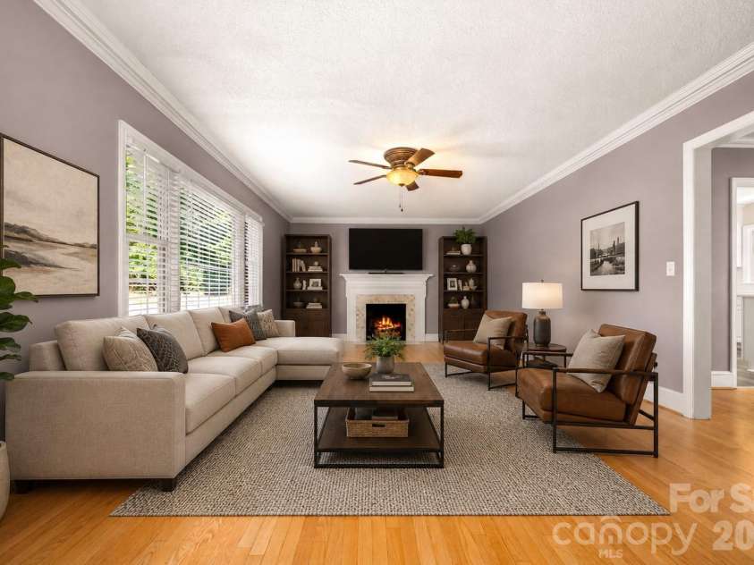 303 Elizabeth Avenue, Forest City, NC 28043.  MLS# CAR4398405, YatesRealty ID 42409. Den - Virtual Staging