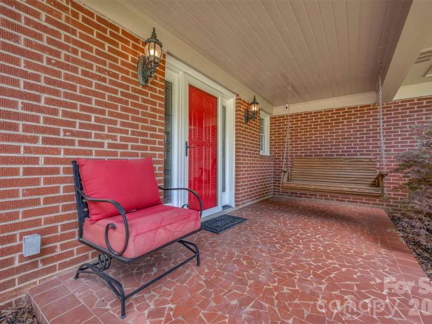 303 Elizabeth Avenue, Forest City, NC 28043.  MLS# CAR4398405, YatesRealty ID 42409. Front Porch