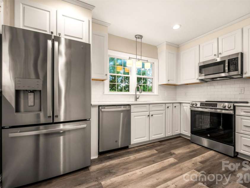 303 Elizabeth Avenue, Forest City, NC 28043.  MLS# CAR4398405, YatesRealty ID 42409. Kitchen