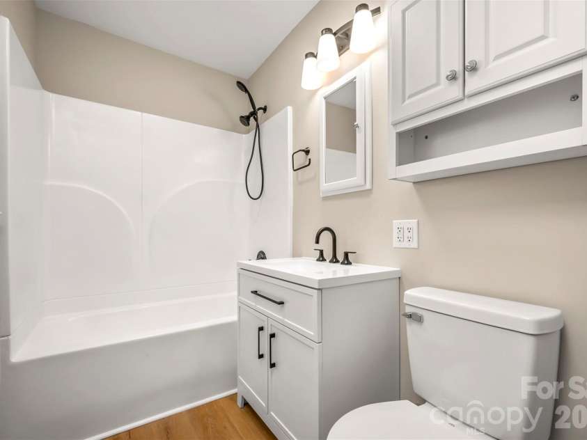 303 Elizabeth Avenue, Forest City, NC 28043.  MLS# CAR4398405, YatesRealty ID 42409. Primary Bathroom