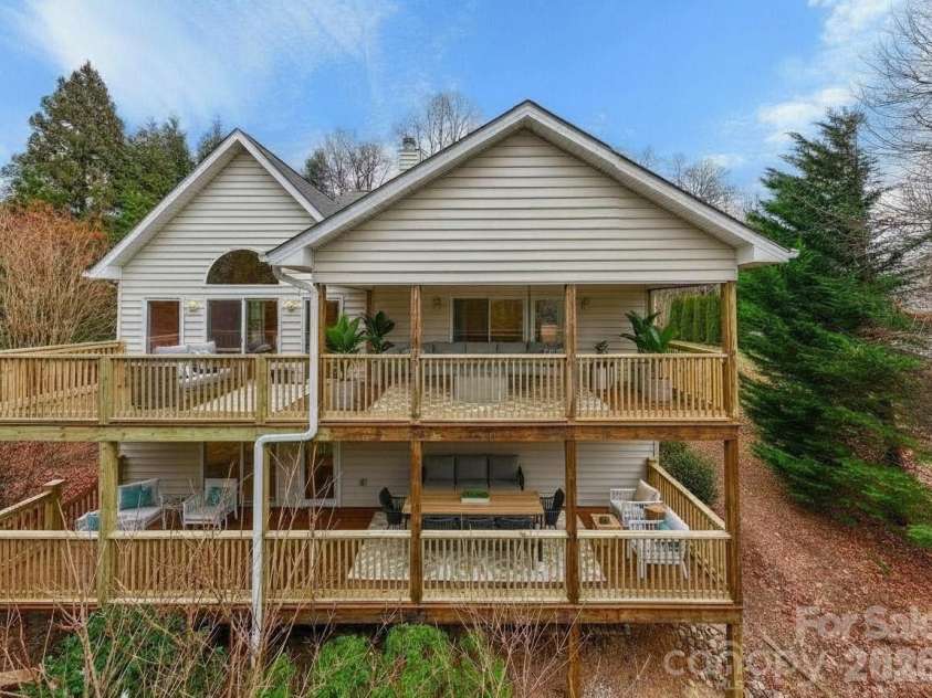 242 Carriage Summitt Way, Hendersonville, NC 28791.  MLS# CAR4335765, YatesRealty ID 42411. Back porch and deck virtually staged