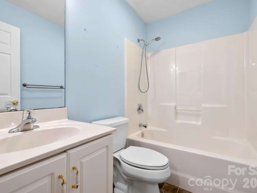 242 Carriage Summitt Way, Hendersonville, NC 28791.  MLS# CAR4335765, YatesRealty ID 42411. Lower level bathroom