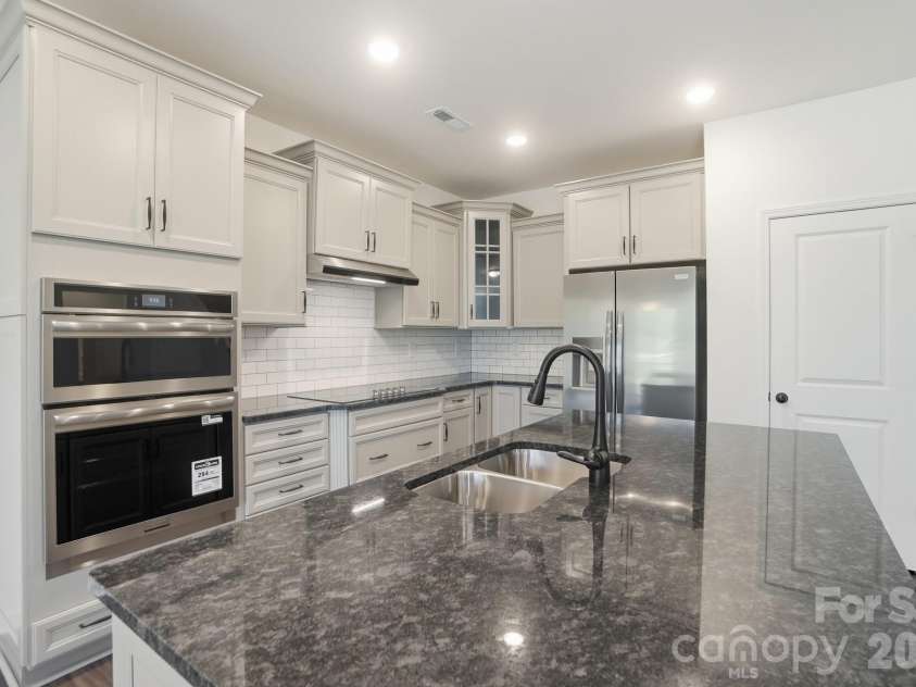 2621 Wild Azalea Court, Monroe, NC 28110.  MLS# CAR4378939, YatesRealty ID 42412. Kitchen