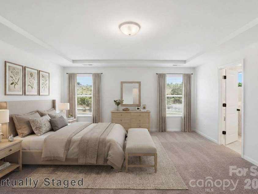 2621 Wild Azalea Court, Monroe, NC 28110.  MLS# CAR4378939, YatesRealty ID 42412. Virtually Staged Primary Bedroom