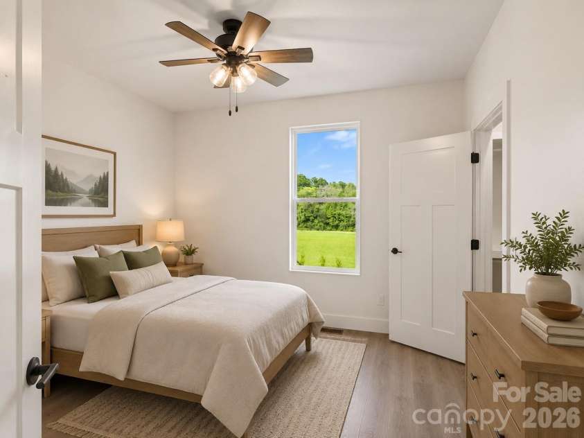 27 Klimovych Road, Hendersonville, NC 28792.  MLS# CAR4399870, YatesRealty ID 42413. Ai rendered - 2nd bedroom