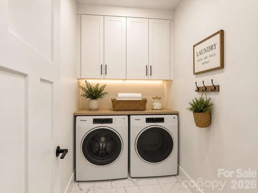 27 Klimovych Road, Hendersonville, NC 28792.  MLS# CAR4399870, YatesRealty ID 42413. Ai rendered -laundry room