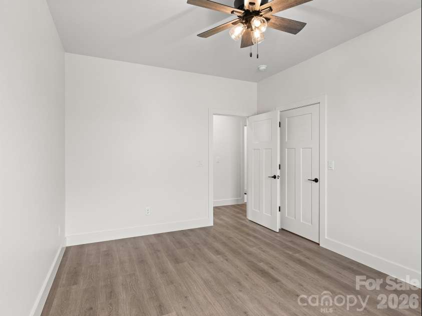 27 Klimovych Road, Hendersonville, NC 28792.  MLS# CAR4399870, YatesRealty ID 42413. Bedroom #3 with walk in closet