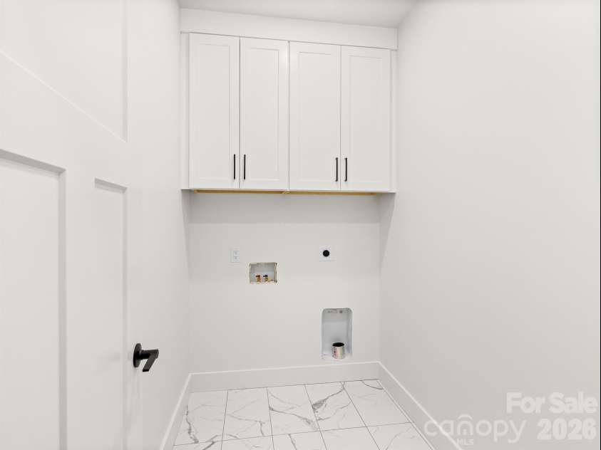27 Klimovych Road, Hendersonville, NC 28792.  MLS# CAR4399870, YatesRealty ID 42413. Laundry room