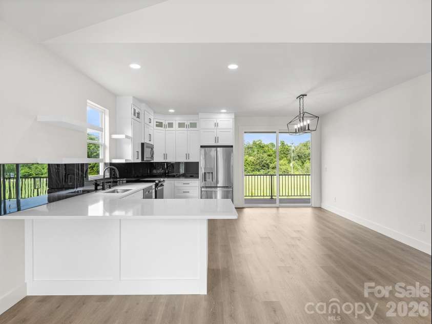 27 Klimovych Road, Hendersonville, NC 28792.  MLS# CAR4399870, YatesRealty ID 42413. Peninsula