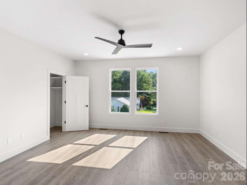 27 Klimovych Road, Hendersonville, NC 28792.  MLS# CAR4399870, YatesRealty ID 42413. Primary bedroom