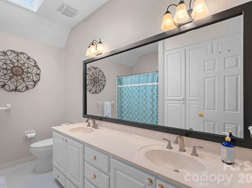 5006 Cranston Court, Charlotte, NC 28277.  MLS# CAR4408843, YatesRealty ID 42422. Hall bathroom