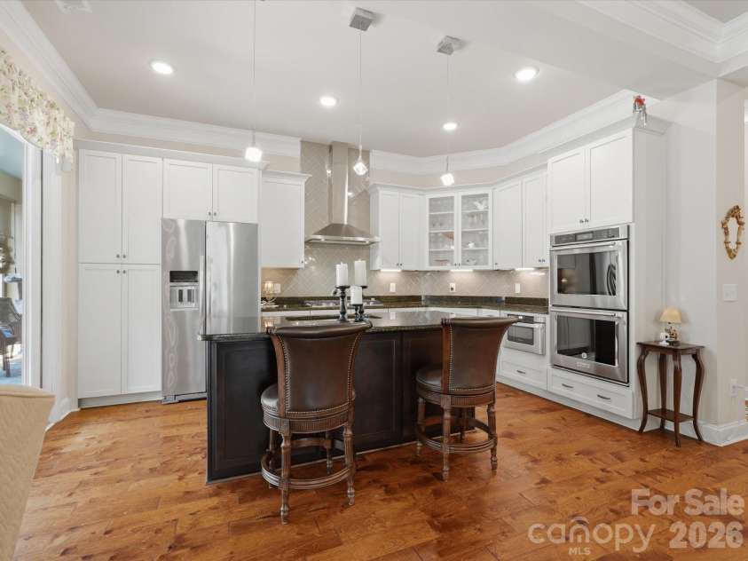 2050 Laney Pond Road, Matthews, NC 28104.  MLS# CAR4406990, YatesRealty ID 42425. Beautiful tile work, updated lighting package and soft close drawers.