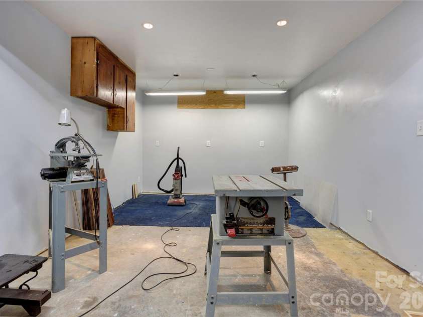 4735 Asherton Place, Concord, NC 28027.  MLS# CAR4409541, YatesRealty ID 42427. Basement work room