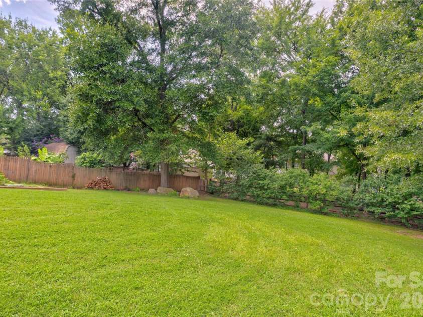 4735 Asherton Place, Concord, NC 28027.  MLS# CAR4409541, YatesRealty ID 42427. Fully fenced backyard