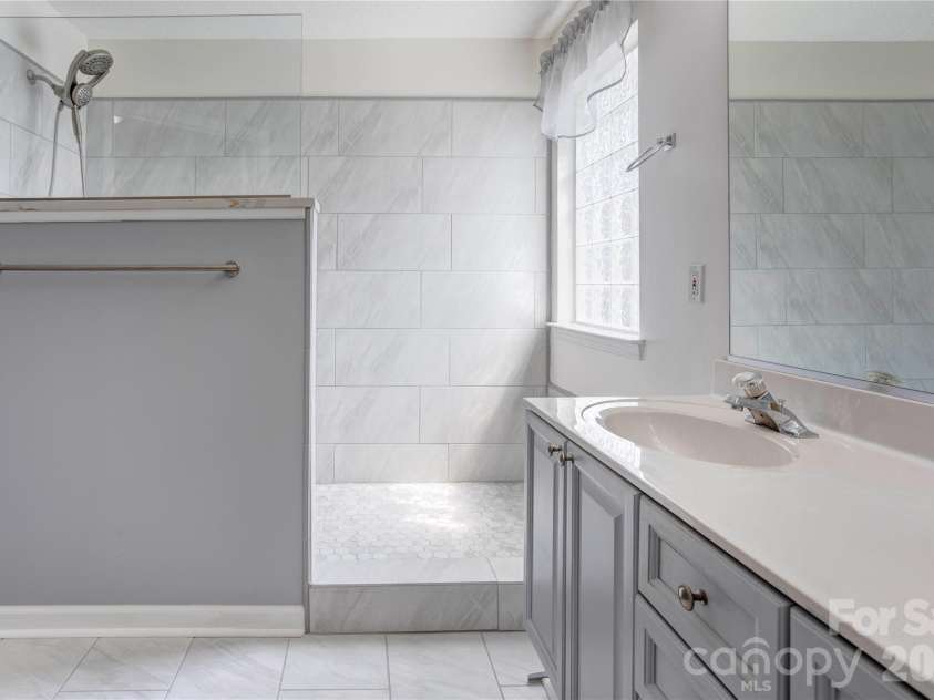 4735 Asherton Place, Concord, NC 28027.  MLS# CAR4409541, YatesRealty ID 42427. Primary bathroom