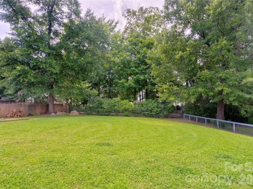 4735 Asherton Place, Concord, NC 28027.  MLS# CAR4409541, YatesRealty ID 42427. Spacious backyard