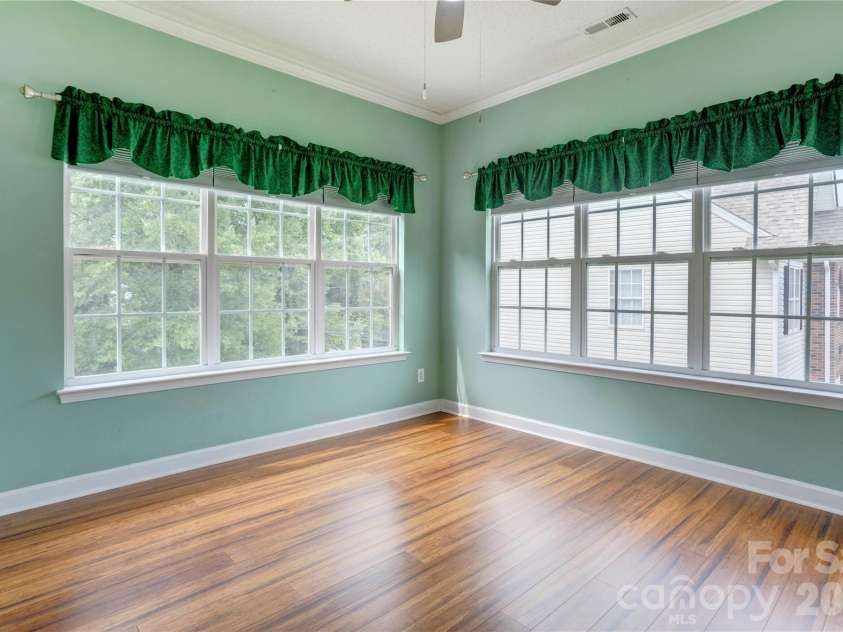 4735 Asherton Place, Concord, NC 28027.  MLS# CAR4409541, YatesRealty ID 42427. Sunroom