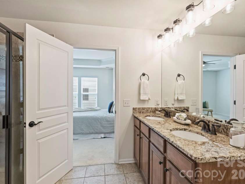 6408 Silver Star Lane, Charlotte, NC 28210.  MLS# CAR4395408, YatesRealty ID 42430. Master bath with double vanity