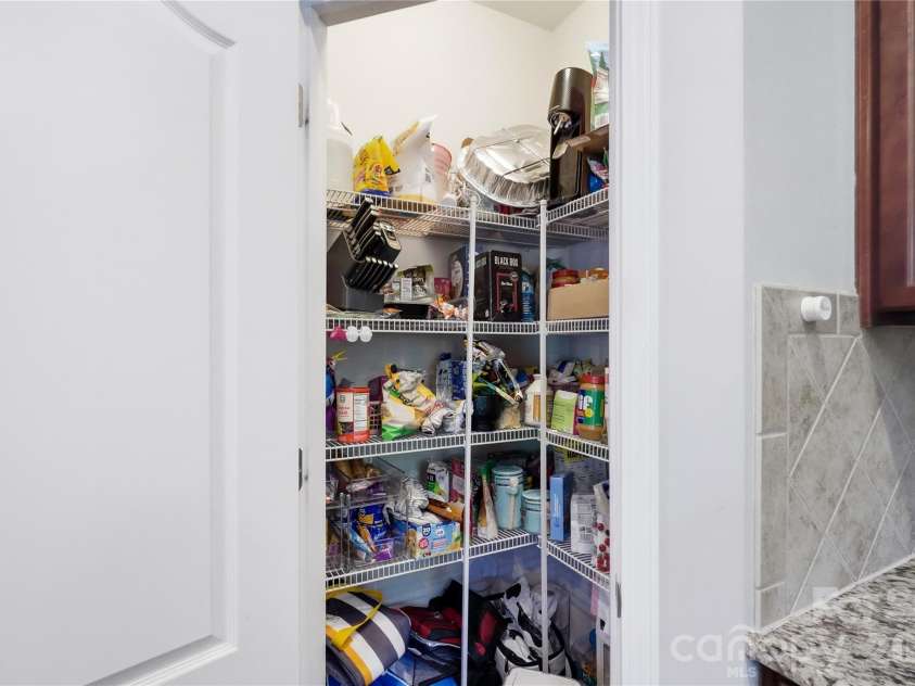 10690 Sapphire Trail, Davidson, NC 28036.  MLS# CAR4410627, YatesRealty ID 42436. Large Pantry Space