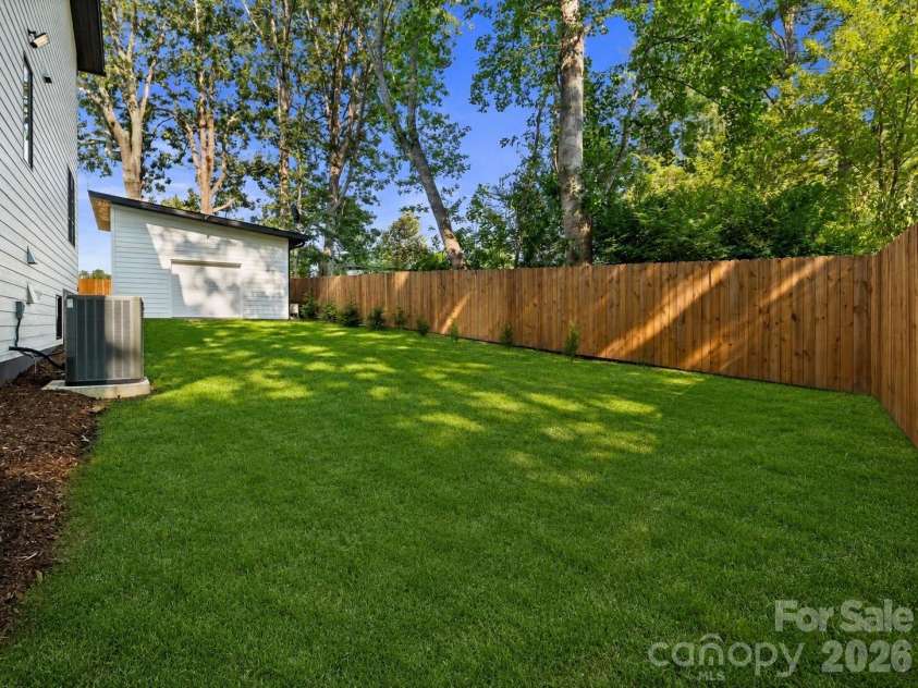 52 Klimovych Road, Hendersonville, NC 28792.  MLS# CAR4411004, YatesRealty ID 42440. Backyard