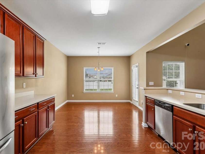 5307 Hackberry Lane, Concord, NC 28027.  MLS# CAR4409364, YatesRealty ID 42445. Kitchen looking towards Breakfast Area