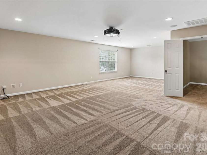 5307 Hackberry Lane, Concord, NC 28027.  MLS# CAR4409364, YatesRealty ID 42445. Media Room