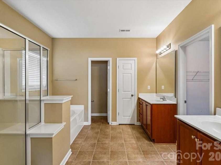 5307 Hackberry Lane, Concord, NC 28027.  MLS# CAR4409364, YatesRealty ID 42445. Primary Bathroom