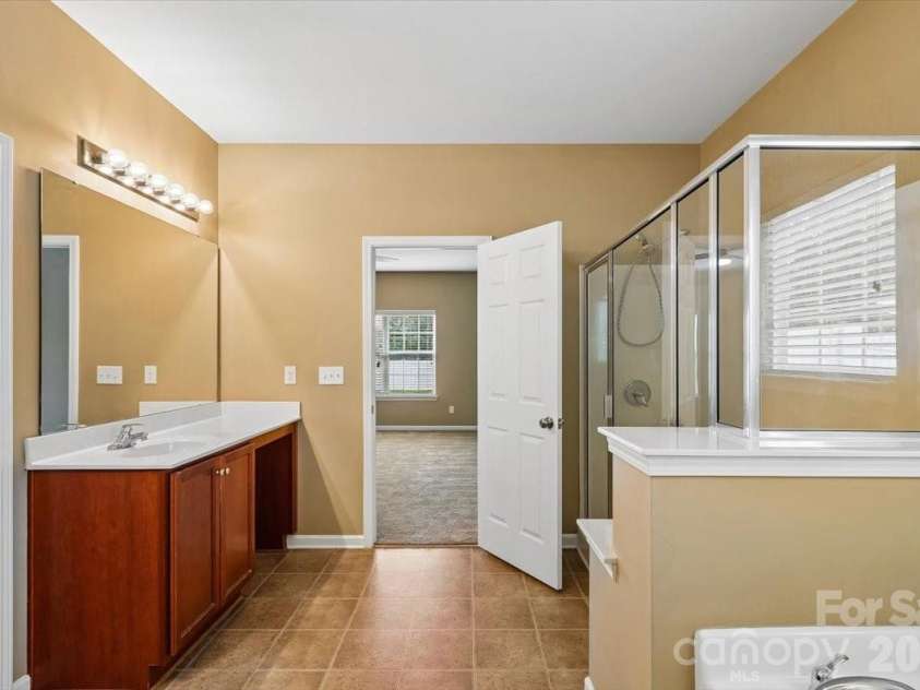5307 Hackberry Lane, Concord, NC 28027.  MLS# CAR4409364, YatesRealty ID 42445. Primary Bathroom