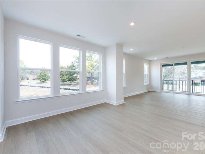 3013 Circles End, Charlotte, NC 28226.  MLS# CAR4396103, YatesRealty ID 42452. End unit added windows to the great room