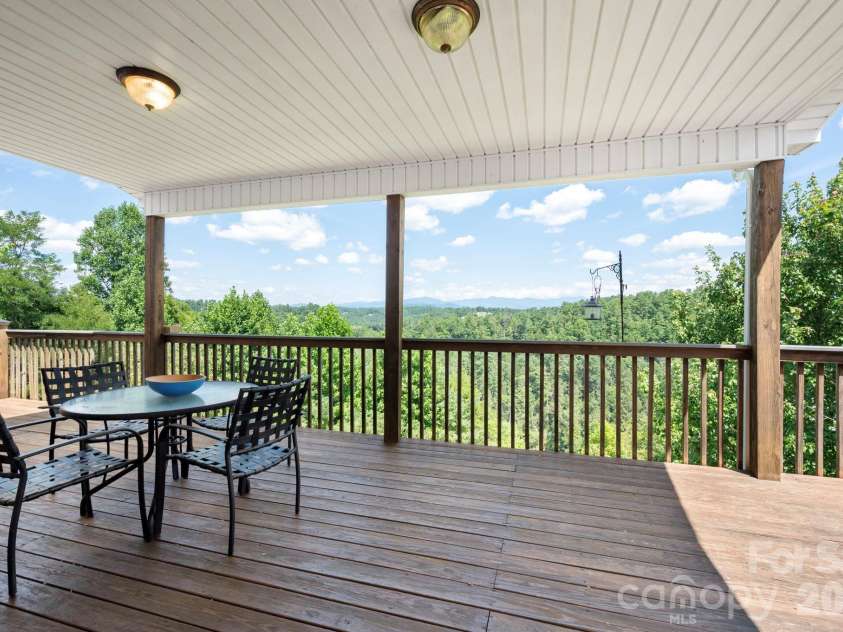92 Bend View Drive, Marshall, NC 28753.  MLS# CAR4411410, YatesRealty ID 42457. Expansive covered rear deck