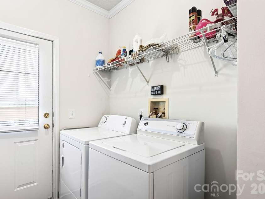 92 Bend View Drive, Marshall, NC 28753.  MLS# CAR4411410, YatesRealty ID 42457. Laundry Mudroom with access to back deck