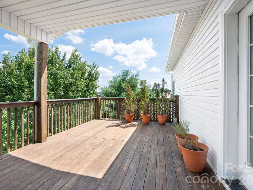 92 Bend View Drive, Marshall, NC 28753.  MLS# CAR4411410, YatesRealty ID 42457. Open deck area for enjoying the sunshine