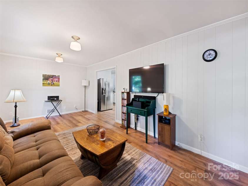 263 Blanton Street, Columbus, NC 28722.  MLS# CAR4190973, YatesRealty ID 4246. Main Level Living Room With Kitchen View