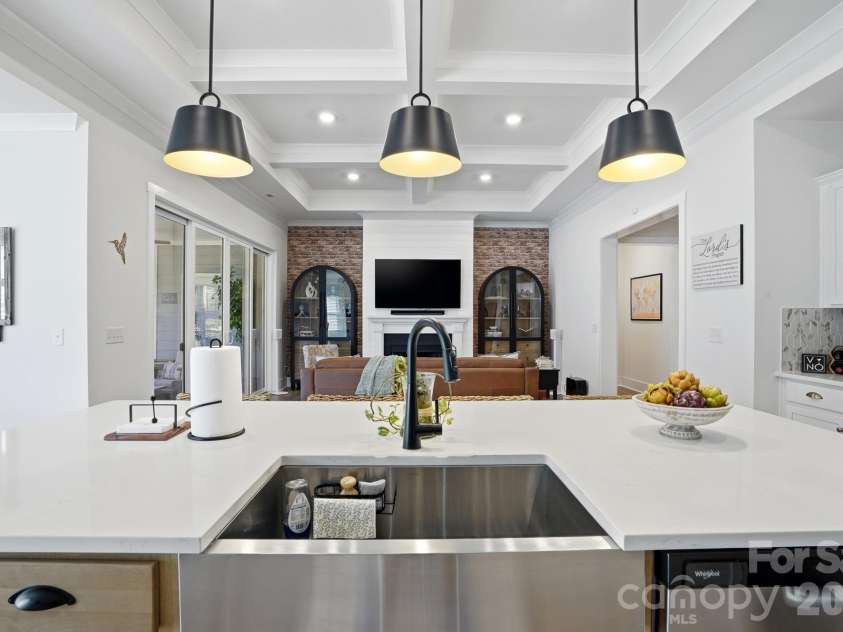 1342 Links Crossing Drive, Monroe, NC 28112.  MLS# CAR4341634, YatesRealty ID 4247. Large Kitchen Island with Sink