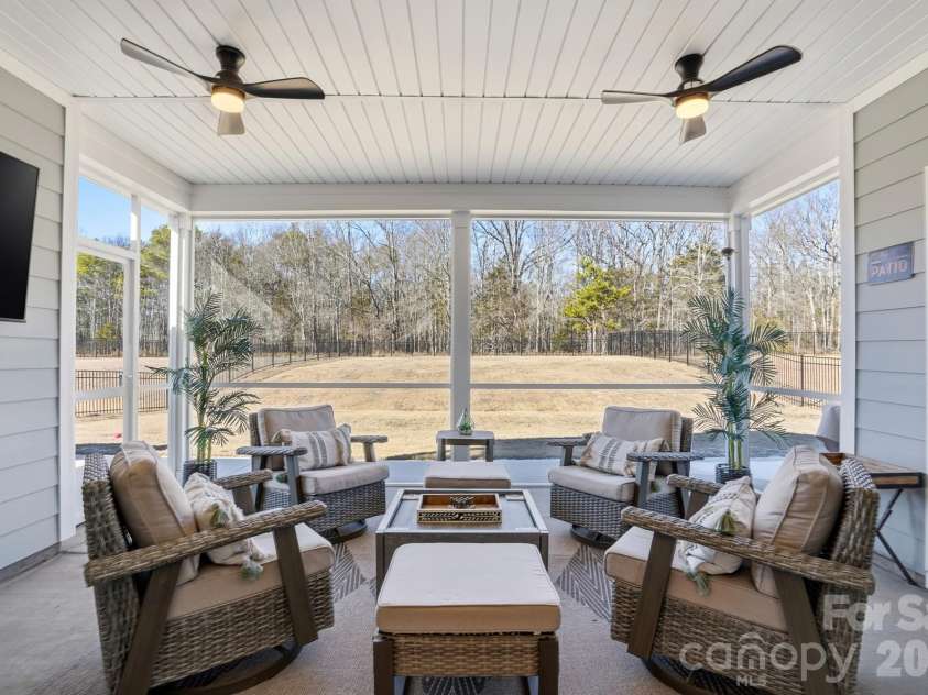 1342 Links Crossing Drive, Monroe, NC 28112.  MLS# CAR4341634, YatesRealty ID 4247. Screened Porch with fans