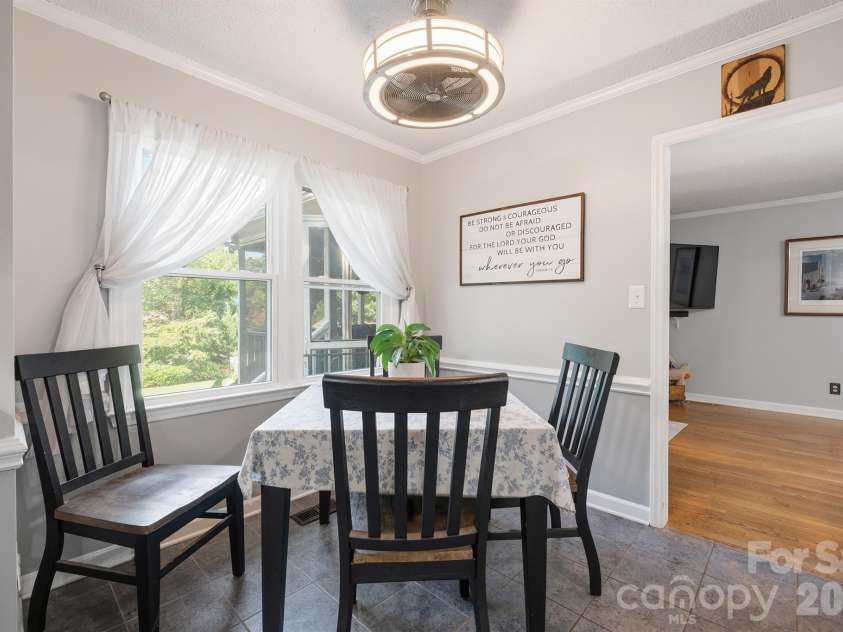 19535 Heartland Street, Cornelius, NC 28031.  MLS# CAR4405802, YatesRealty ID 42476. Breakfast nook overlooking the backyard