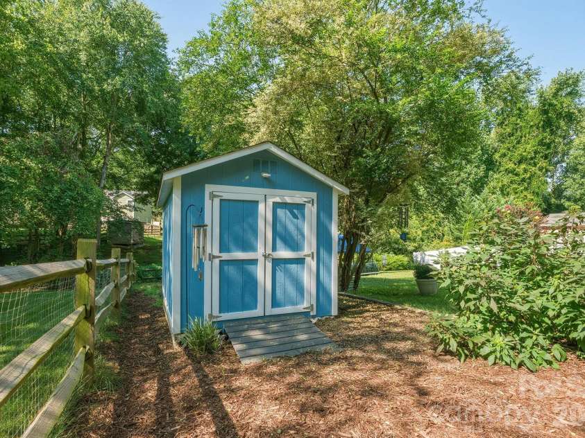 19535 Heartland Street, Cornelius, NC 28031.  MLS# CAR4405802, YatesRealty ID 42476. Storage building conveys