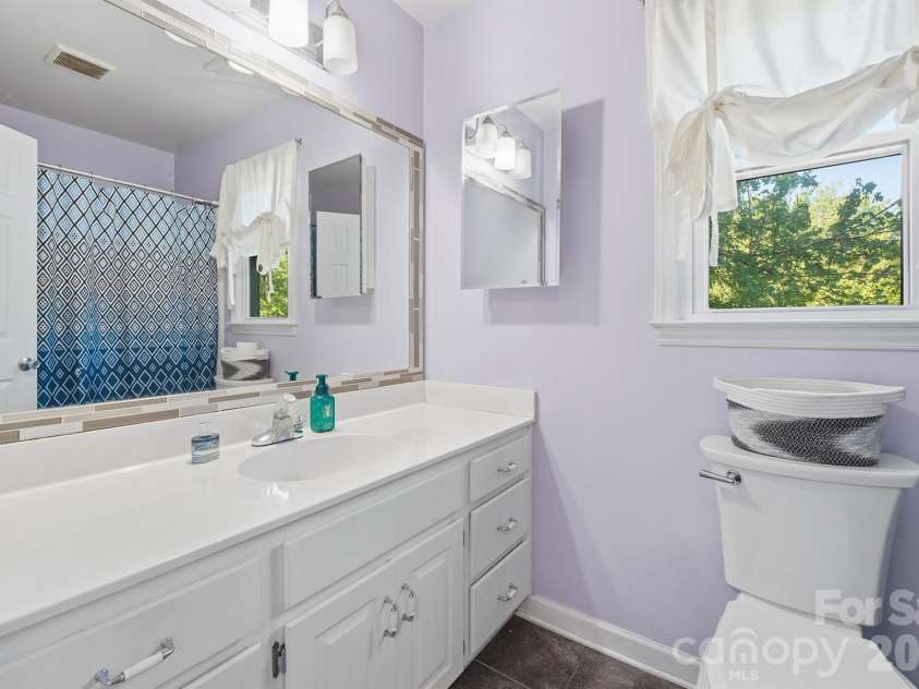 19535 Heartland Street, Cornelius, NC 28031.  MLS# CAR4405802, YatesRealty ID 42476. Upstairs hall bath