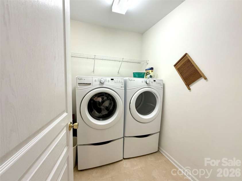 9610 Corbett Square Lane, Charlotte, NC 28214.  MLS# CAR4408193, YatesRealty ID 42477. Upstairs laundry room